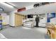 Finished basement area with lounge seating, a TV, and recreation and bar area at 7610 S Garland St, Littleton, CO 80128