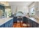Well-equipped kitchen featuring modern appliances, ample countertop space, and custom cabinetry at 7289 Stroh Rd, Parker, CO 80134