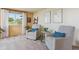 Cozy sitting area with chairs, side table and view to a backyard at 7289 Stroh Rd, Parker, CO 80134
