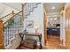Carpeted staircase that sits adjacent to the kitchen at 7289 Stroh Rd, Parker, CO 80134