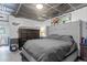 Comfortable bedroom with a large bed, stylish decor, and ample natural light at 110 S Hoyt St, Lakewood, CO 80226