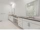 This bathroom features double sinks, modern fixtures, and great lighting at 3856 Treadway Pt, Castle Rock, CO 80108