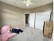 Third bedroom with double closet and view to hallway at 23080 York Ave, Parker, CO 80138