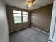 Bedroom with large windows and ceiling fan at 23080 York Ave, Parker, CO 80138