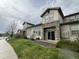 Townhouse exterior with patio and landscaping at 23080 York Ave, Parker, CO 80138