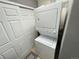 Stackable washer and dryer in a bright laundry room at 23080 York Ave, Parker, CO 80138