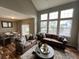 Spacious living room with hardwood floors and a view of the backyard at 23080 York Ave, Parker, CO 80138