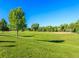 Vibrant green park with baseball field provides a serene outdoor space at 6720 S Adams Way, Centennial, CO 80122