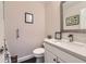 Modern powder room with updated vanity and fixtures at 4611 S Kalispell Way, Aurora, CO 80015