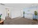 Spacious living room with neutral colors, including a stylish cabinet and charming decor at 18284 E 52Nd Pl, Denver, CO 80249