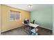 Comfortable office space featuring ample light from the window and neutral colored walls for a relaxing workspace at 18284 E 52Nd Pl, Denver, CO 80249