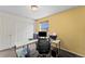 Home office space with desk, task chair, and plenty of storage, ideal for a productive work environment at 18284 E 52Nd Pl, Denver, CO 80249