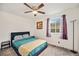 Cozy bedroom with natural light, soft carpet, and modern decor, creates a relaxing retreat at 1027 Auburn Dr, Erie, CO 80516
