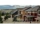 Attractive home exterior displaying a well-maintained yard and privacy fence in a Gathering neighborhood at 1027 Auburn Dr, Erie, CO 80516