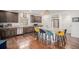 Spacious kitchen with a large island, stainless steel appliances, and hardwood floors at 1027 Auburn Dr, Erie, CO 80516