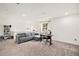 Spacious living area provides a flexible setup, ideal for both relaxing and working from home at 1027 Auburn Dr, Erie, CO 80516
