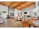 Stylish clubhouse lounge with fireplace, wood ceilings, lounge chairs, and entertaining area at 1027 Auburn Dr, Erie, CO 80516