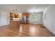 Modern kitchen featuring stainless steel appliances, a center island, and hardwood floors at 29827 Gigi Rd, Evergreen, CO 80439