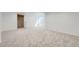 Spacious basement with carpeted floors, a closet and ample room for a variety of uses at 7762 S Eudora Ct, Centennial, CO 80122