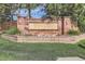 Stone entrance sign for Heritage Greens community with manicured lawn at 7762 S Eudora Ct, Centennial, CO 80122