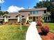 Two-story house with landscaped yard and walkway at 7762 S Eudora Ct, Centennial, CO 80122