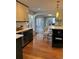 Updated kitchen with island and access to patio at 7762 S Eudora Ct, Centennial, CO 80122