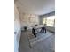 Bright home office with a modern desk, custom wall art, and a large window offering natural light at 7762 S Eudora Ct, Centennial, CO 80122