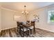 Formal dining room with stylish lighting and modern decor at 16257 E Belleview Pl, Centennial, CO 80015