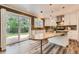 Modern kitchen featuring granite countertops and stainless steel appliances at 16257 E Belleview Pl, Centennial, CO 80015