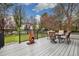 Backyard patio with an outdoor dining area and chiminea at 22070 Day Star Dr, Parker, CO 80138