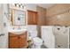 Bathroom with tile surround, vanity, toilet, and walk in tub at 22070 Day Star Dr, Parker, CO 80138