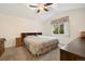 Cozy bedroom featuring neutral walls, soft carpeting, and a window to let in natural light at 22070 Day Star Dr, Parker, CO 80138