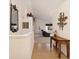 Inviting hallway features beautiful wood floors, vaulted ceilings and stylish decor at 22070 Day Star Dr, Parker, CO 80138