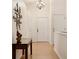 Inviting hallway features beautiful wood floors, vaulted ceilings and stylish decor at 22070 Day Star Dr, Parker, CO 80138