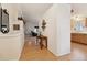 Inviting hallway features beautiful wood floors, vaulted ceilings and stylish decor at 22070 Day Star Dr, Parker, CO 80138