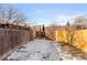 Backyard with wooden fence and alley access at 2929 N Josephine St, Denver, CO 80205