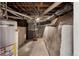 Unfinished basement showing HVAC and water heater at 2929 N Josephine St, Denver, CO 80205