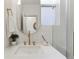 Modern bathroom with a white sink and gold fixtures at 2929 N Josephine St, Denver, CO 80205