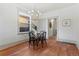 Dining room features hardwood floors and chandelier at 2929 N Josephine St, Denver, CO 80205