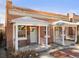 Updated brick duplex with a charming front porch and new paint at 2929 N Josephine St, Denver, CO 80205