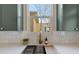 Kitchen features a farmhouse sink and a window overlooking the backyard at 2929 N Josephine St, Denver, CO 80205