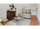 Bright living room featuring hardwood floors, fireplace, and stylish furniture at 2929 N Josephine St, Denver, CO 80205