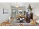 Living room with hardwood floors, fireplace, and ample natural light at 2929 N Josephine St, Denver, CO 80205