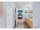 Bright bathroom leading to the main bedroom and featuring a glass-enclosed shower and modern vanity at 1438 Little Raven St # 310, Denver, CO 80202