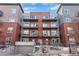 Well-maintained condo building featuring brick and modern architecture at 1438 Little Raven St # 310, Denver, CO 80202