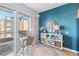 Bright home office with walkout balcony, natural light, and stylish décor at 1438 Little Raven St # 310, Denver, CO 80202