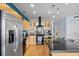 Well-equipped kitchen with modern appliances and a large center island at 1438 Little Raven St # 310, Denver, CO 80202