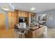 Comfortable living room featuring built-in shelves and cabinetry, with access to a balcony offering natural light at 1438 Little Raven St # 310, Denver, CO 80202