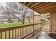 Cozy balcony overlooking well-maintained grounds and surrounding buildings, ideal for unwinding at 10293 E Peakview Ave # F104, Englewood, CO 80111