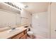 Relaxing bathroom featuring a soaking tub, ample storage, and a clean, neutral palette at 10293 E Peakview Ave # F104, Englewood, CO 80111